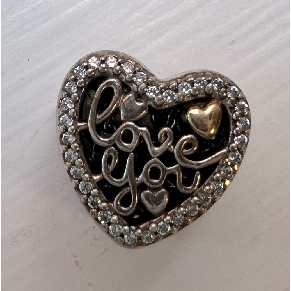 925 sterling silver fancy “Love You” Pandora style heart shaped charm.